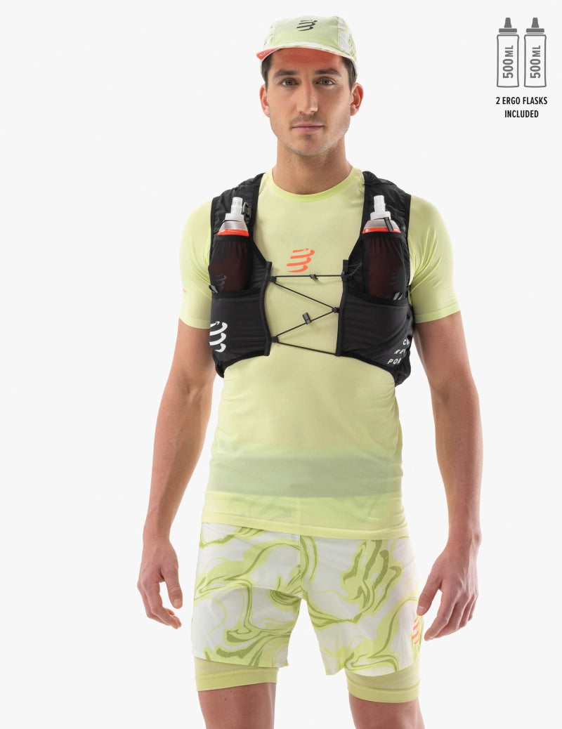 compressport ultrun evo 10 pack for men and women, super light trail running back pack for ultra distance, black colour, man wearing black compressport vest with neon yellow shirt and shorts on white background