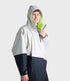 dryrobe long sleeve changing robe for all gender, light grey and navy colour with lime green interior, woman wearing dryrobe zipped up