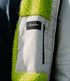 dryrobe long sleeve changing robe for all gender, light grey and navy colour with lime green interior, close up of pocket 