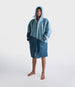 dryrobe long sleeve changing robe for all gender, light blue colour with dark blue contrast, man wearing dryrobe zipped up