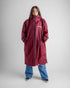 woman wearing dryrobe changing robe in new burgundy colour with zip up