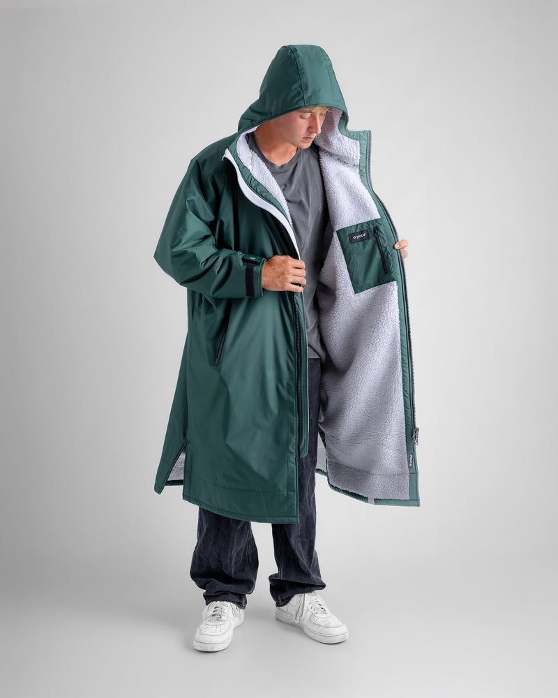 man wearing new colour green in dryrobe long sleeve advance
