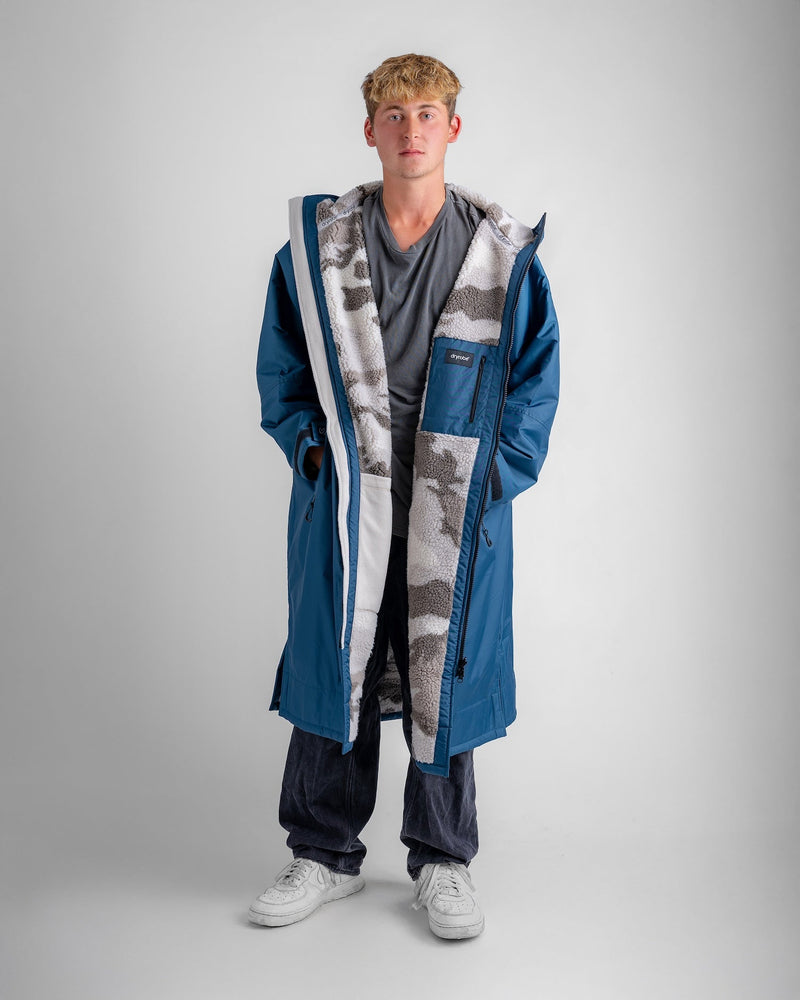 man wearing dryrobe long sleeve changing robe with zip open, showing camo fleece lining