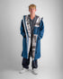 man wearing dryrobe long sleeve changing robe with zip open, showing camo fleece lining