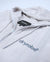 dryrobe towel robe for men and women, full zip towel robe for after swimming, light grey white colour with grey sleeve caps, close up of zipper on flat dryrobe