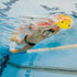 man underwater swimming in pool with snorkle and yellow finis swimming kickboard 