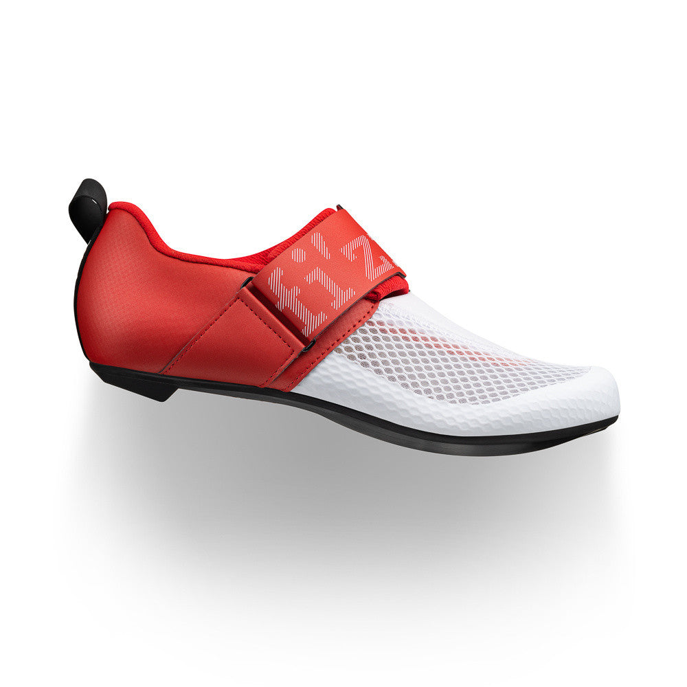 fizik transiro hydra cycling shoes, breathable triathlon fast transition cycling shoe, white with red heel and strap, side profile of shoe