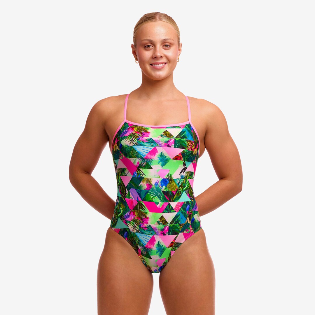 woman wearing funkita swimwear, sub lime pattern, single strap syle