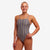 woman wearing funkita tie me tight swimsuit, admirality stripe pattern