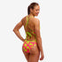Funkita tie me tight swim suit, woman wearing sweet coconuts pattern in pink and yellow, showing back straps
