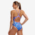 funkita womens one piece diamond back swimsuit, blue geometric pattern with pink strap detail, back of woman wearing swim suit on white background