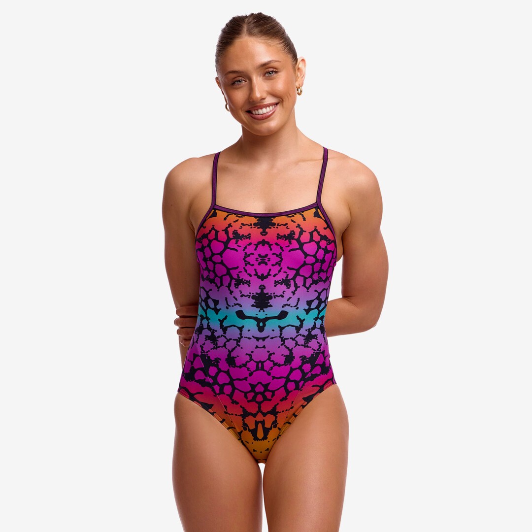 funkita womens single strap swim suit, one peice swim suit with thing strap and open back, rainbow animal print with maroon strap, woman wearing swimsuit on white background