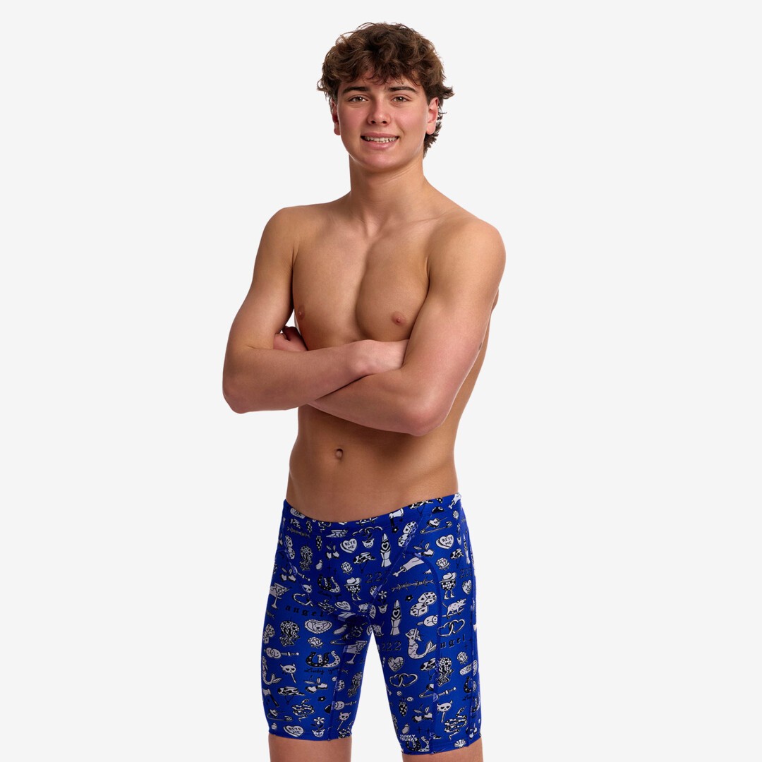 funky trunks boys jammers, boys swimming trunks, blue with white design, boy wearing swimming bottoms on white background