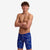 funky trunks boys jammers, boys swimming trunks, blue with white design, boy wearing swimming bottoms on white background