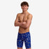 funky trunks boys jammers, boys swimming trunks, blue with white design, boy wearing swimming bottoms on white background