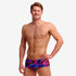 man wearing funky trunks classic trunks in big bang pattern
