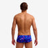 man wearing funky trunks classic trunks in rising tide pattern, showing back