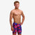Boy wearing funky trunks jammer in big bang pattern