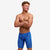 boy wearing funky trunks swim jammers in pebble beach pattern
