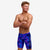 boy wearing funky trunks swim jammers in rising tide pattern