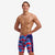 man wearing funky trunks swim jammer in wave craze pattern
