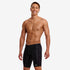 funky trunks mens jammers, tight swim shorts, black with small white pattern, man wearing swim bottoms on white background 