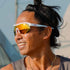 goodr sonic g wrap sunglasses for running with frame vents, white frame with mirrored reflective lenses, person wearing sunglasses while running