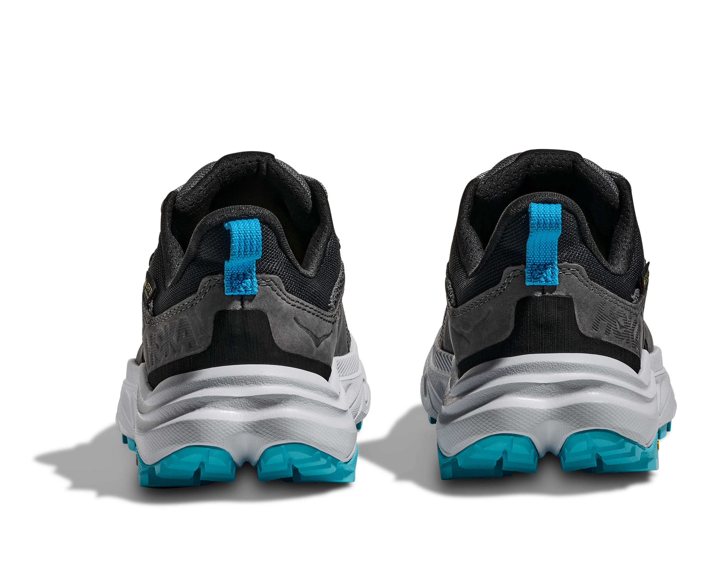 Dark grey hoka waterproof womens hiking shoe with light grey and blue accents on heels