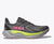 hoka arahi 8 for women, lightweight cushioned support shoe for overpronation when running, dark grey colour with pink details and lime green and grey sole, side profile of runner