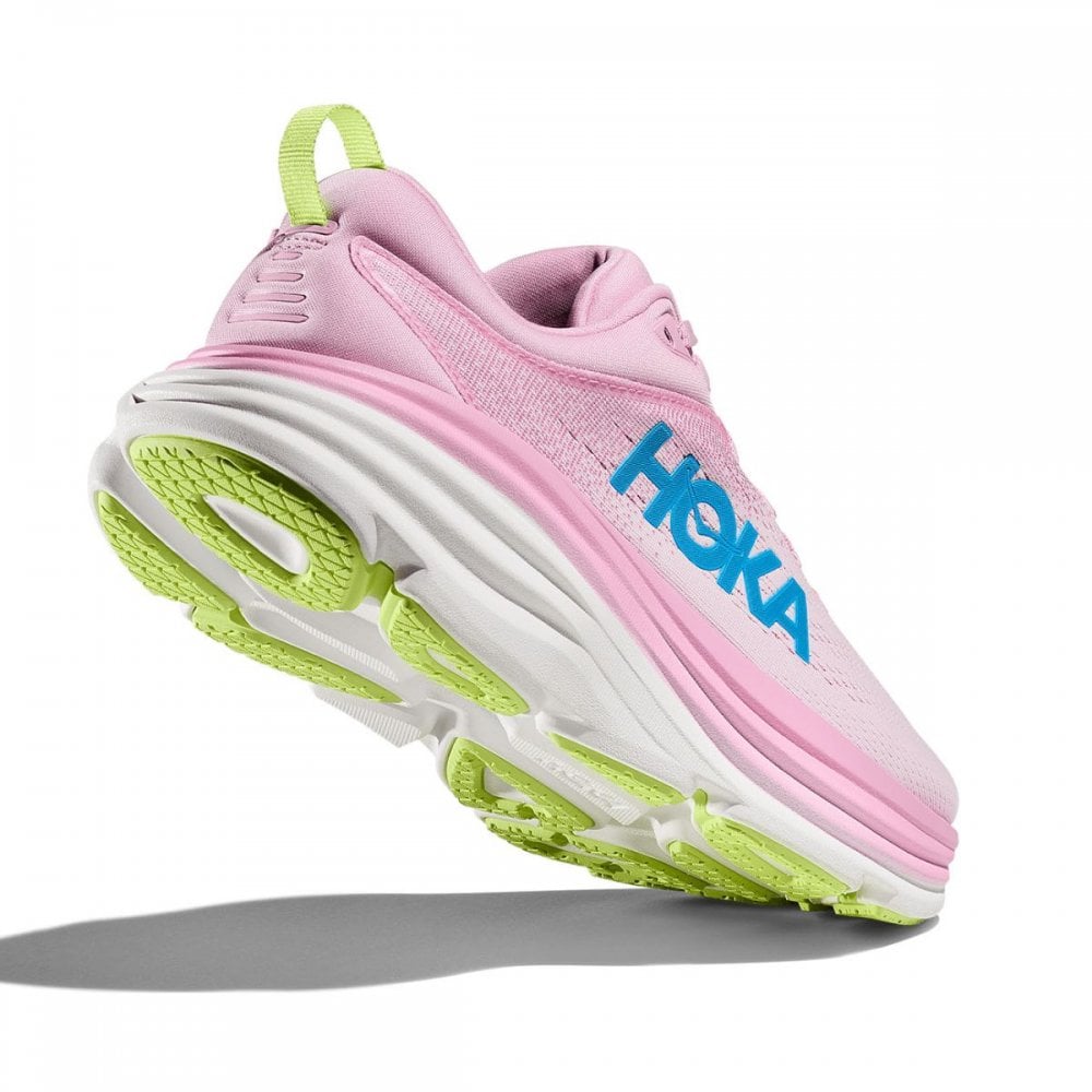 Pink hoka bondi 8 running shoe with green sole