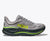 Light grey hoka bondi 9 running shoe with black and green accents