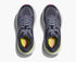Pair of grey hoka bondi running shoes with pink and green accents view from above
