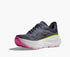 grey hoka bondi running shoes with pink and green accents on the inside