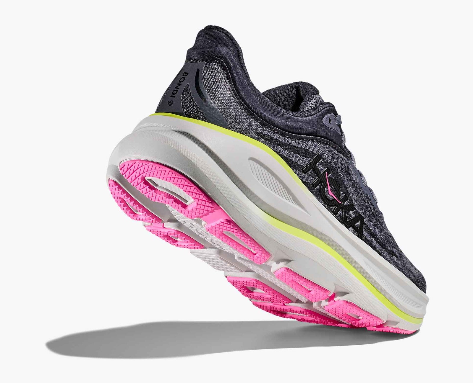 grey hoka bondi running shoes with pink and green accents with pink sole