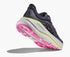 grey hoka bondi running shoes with pink and green accents with pink sole