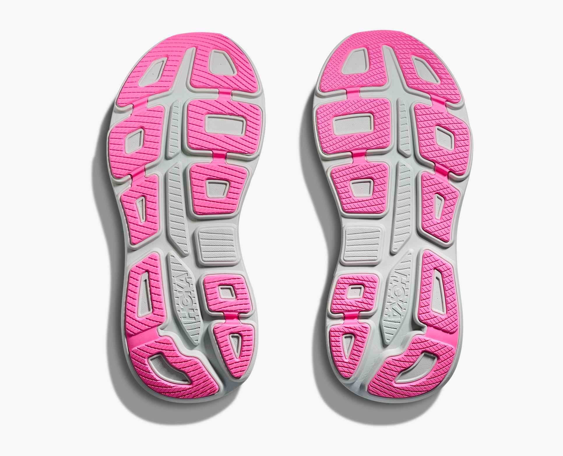 grey hoka bondi running shoes with pink soles
