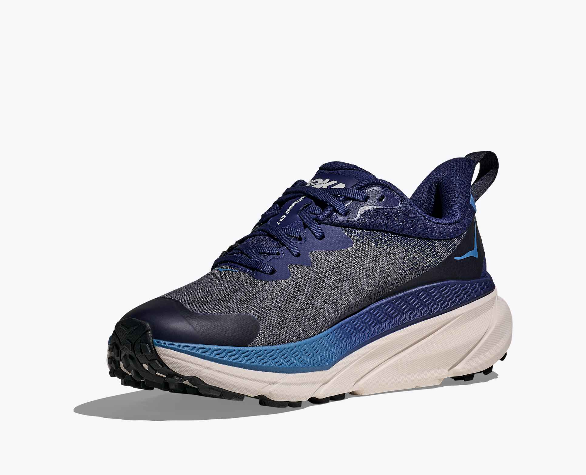 hoka challenger 7 gtx for mens, waterproof road and trail running shoe, navy blue with white sole and logo, inside angled profile of shoe