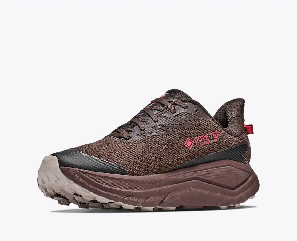 hoka challenger 8 gtx for men, waterproof gravel road to trail running and walking shoe, dark brown colour with black details and red logo, side profile of shoe
