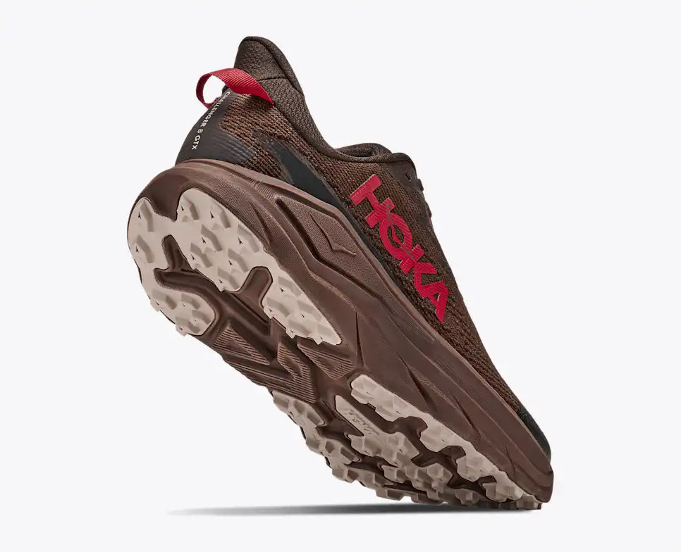 hoka challenger 8 gtx for men, waterproof gravel road to trail running and walking shoe, dark brown colour with black details and red logo, side profile of shoe