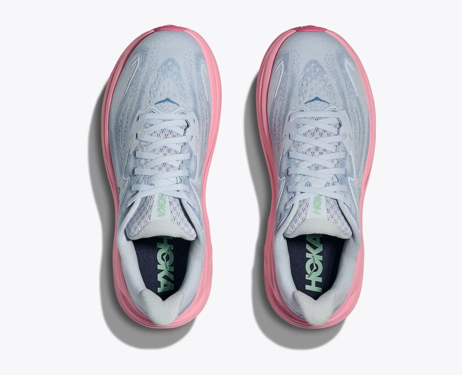 hoka clifton 10 for women, lightweight cushioned road running and walking shoe, light blue colour with pink sole, top of shoes