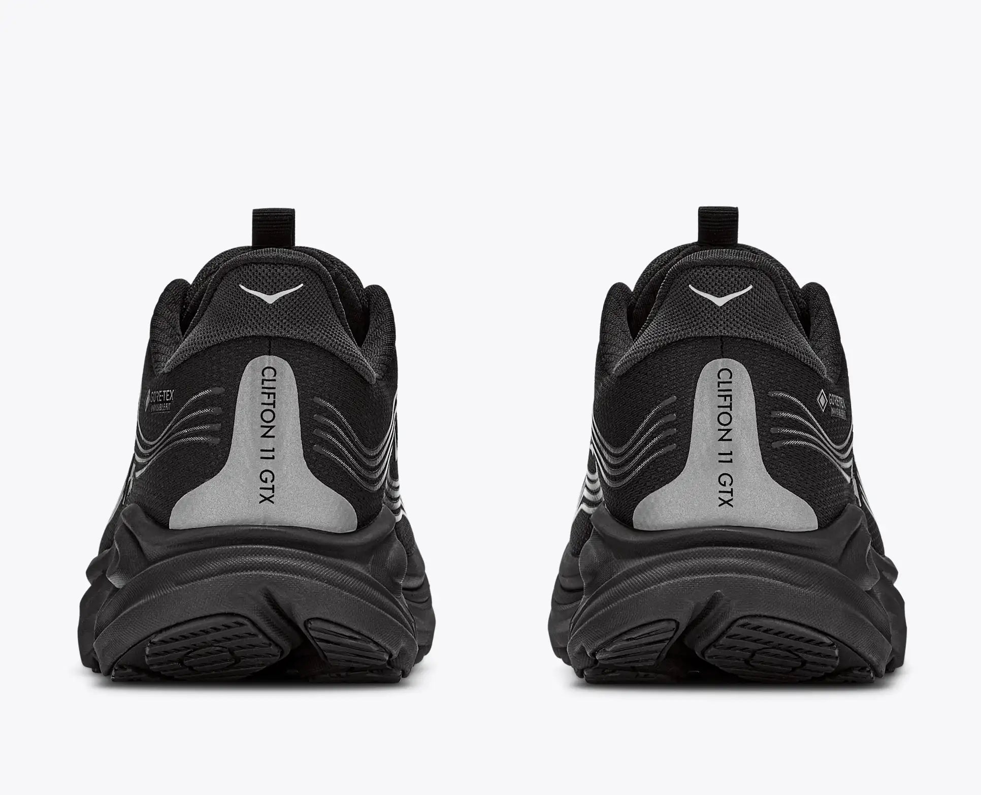 hoka clifton 11 GTX mens, lightweight cushioned waterproof road running and walking shoe with quick elastic tie, black with black sole and reflective silver details, heels of shoe