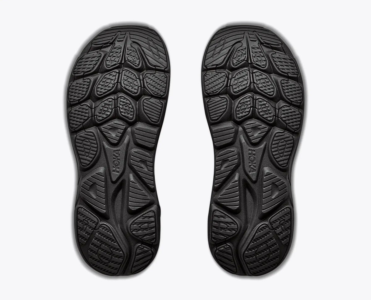 hoka clifton 11 GTX mens, lightweight cushioned waterproof road running and walking shoe with quick elastic tie, black with black sole and reflective silver details, soles of shoe
