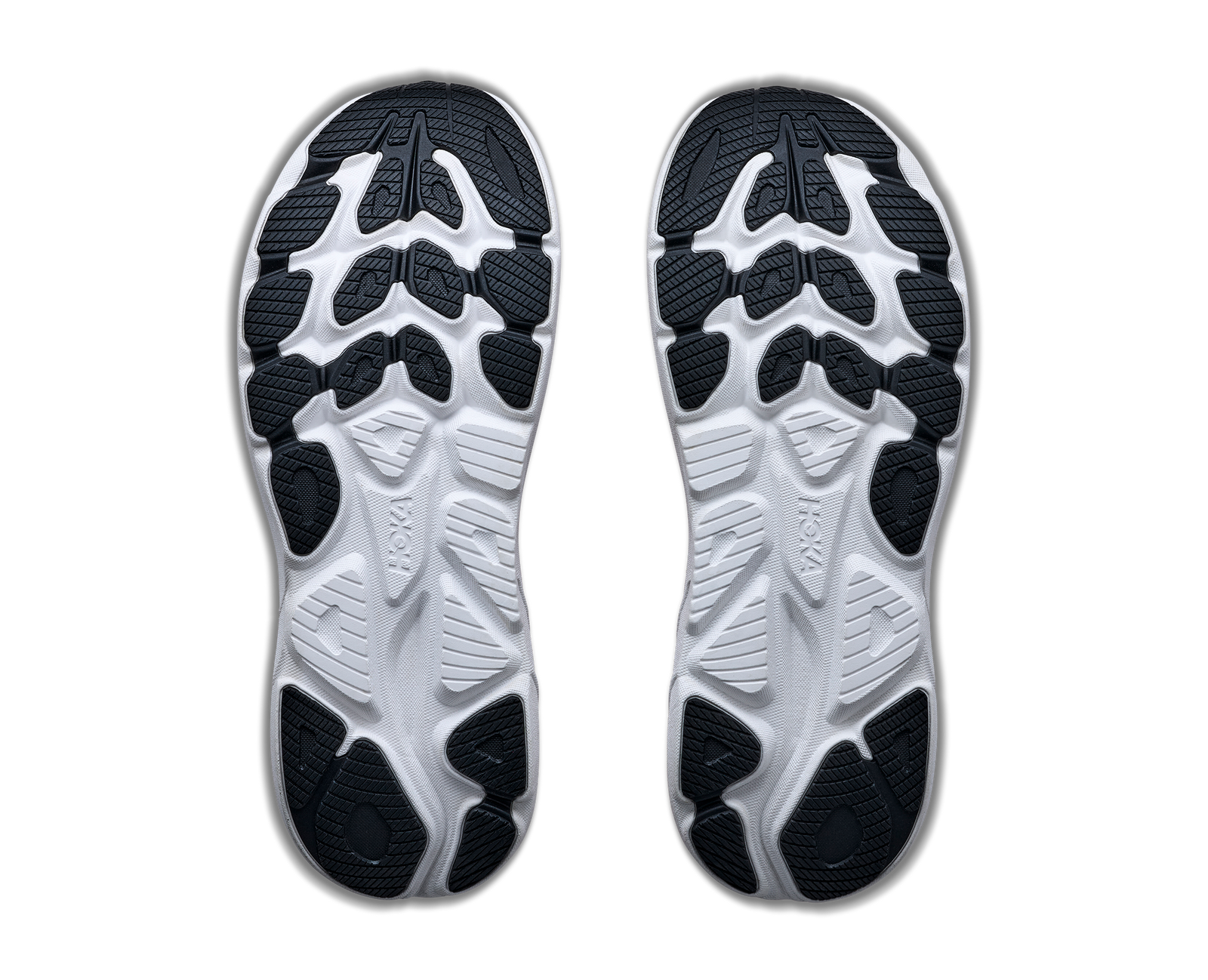  hoka clifton 11 for men, lightweight cushioned road running and walking shoes, white with bright orange and black details, profile of soles of shoe on a white background