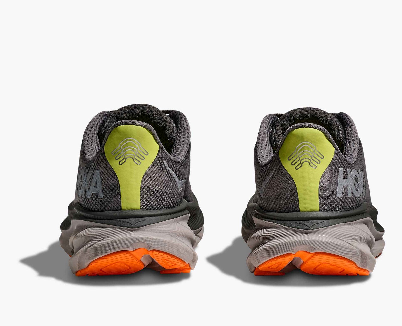 Dark grey hoka mens waterproof running shoe with orange sole and lime green details on the heels