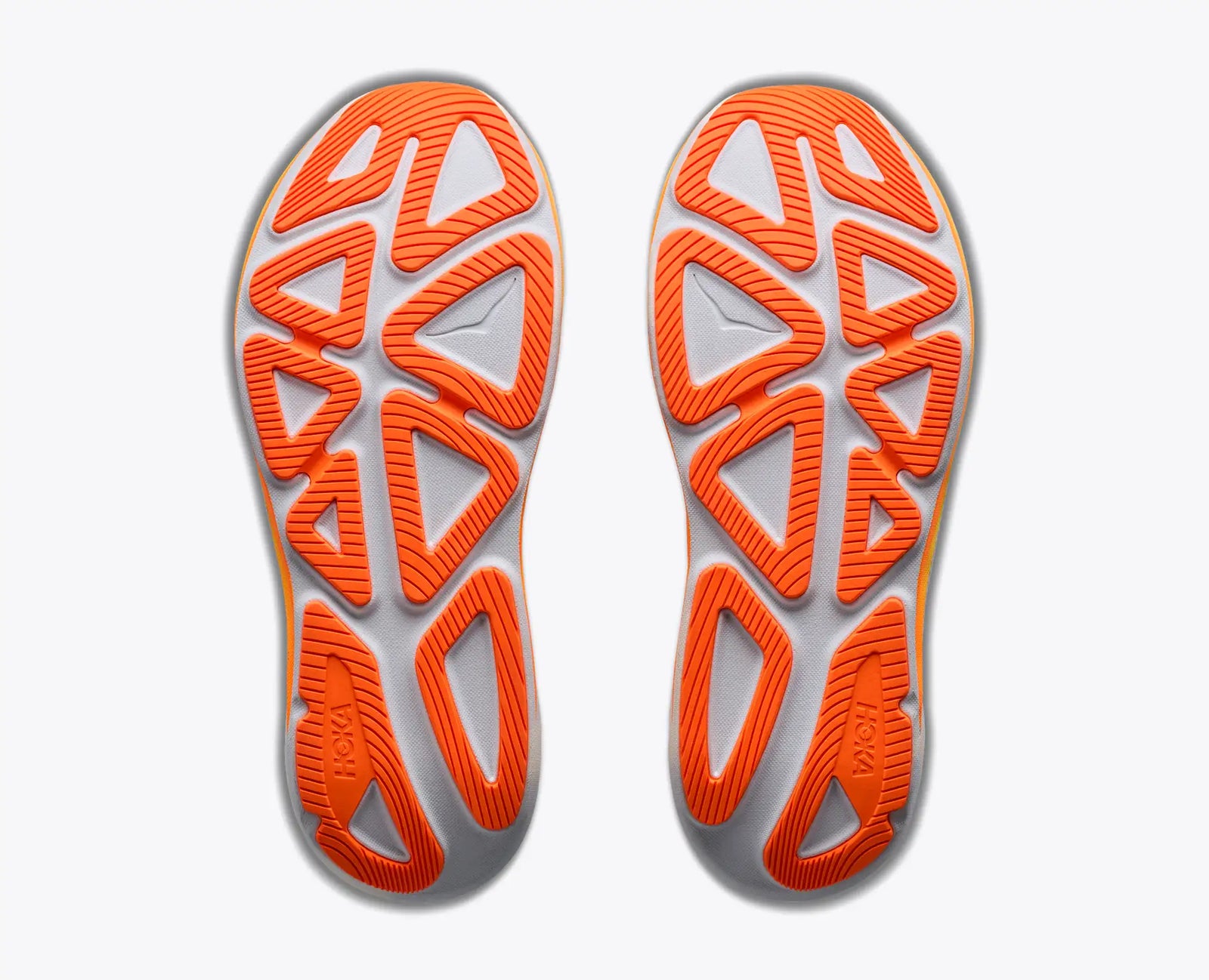 hoka clifton pro mens, responsive soft cushioned daily running shoe for faster paces, white shoe with neon orange and yellow details and black hoka logo, sole of shoes