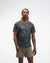 hoka everyrun men short sleeve shirt, lightweight and breathable running shirt with white wave line design on black tshirt, man wearing shirt 