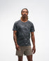 hoka everyrun men short sleeve shirt, lightweight and breathable running shirt with white wave line design on black tshirt, man wearing shirt 