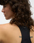 hoka everyrun womens tank in black. The  ultralight tank is tuned for daily training with comfort-first design details. Cut from our breathable, quick-dry FlyLite™ material, the slim-fit silhouette wicks sweat to keep you dry from first mile to last.