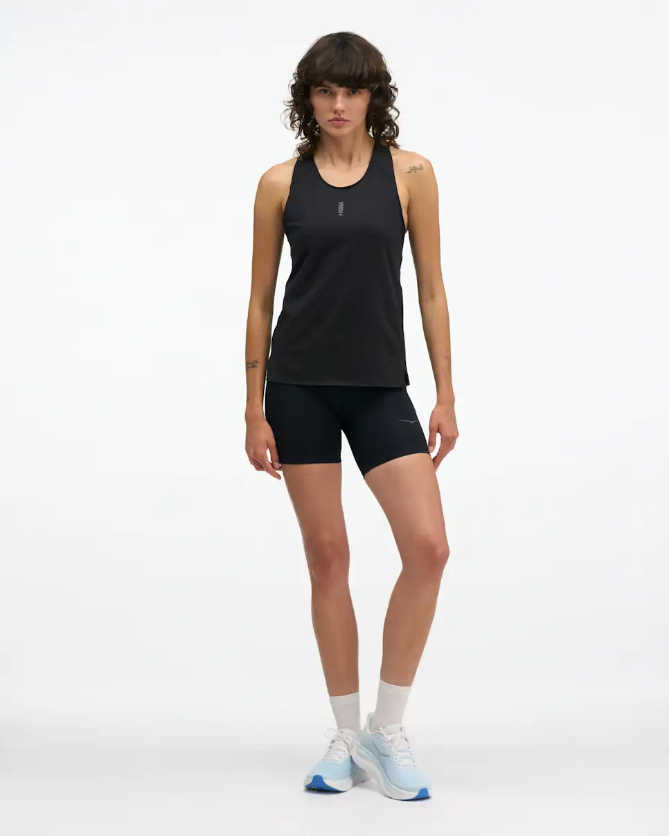 hoka everyrun womens tank in black. The  ultralight tank is tuned for daily training with comfort-first design details. Cut from our breathable, quick-dry FlyLite™ material, the slim-fit silhouette wicks sweat to keep you dry from first mile to last.