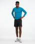 HOKA Glide 7'' Short 2-in-1, lightweight running short with inner short, black colour, man wearing black shorts with long sleeve blue shirt and white shoes